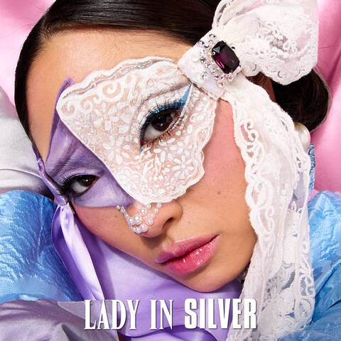 Lady in Silver section displaying NYX Royal Blush Palettes product on a purple floral background.