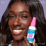 The Face Glue Setting Spray
