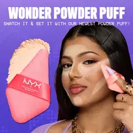 Model with marked areas for setting powder placement holding Wonder Snatch Powder Puff for cross-sell